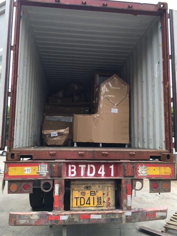 Shipping container loaded with crated equipment